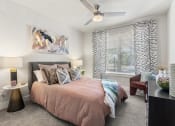 Thumbnail 9 of 60 - Longleaf at St. Johns Apartments | St. Johns, FL | Bedroom with Ceiling Fan