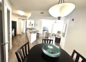 Thumbnail 15 of 46 - a dining room table with a bowl on top of it