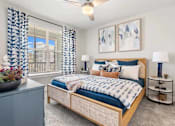 Thumbnail 8 of 59 - Longleaf at St. Johns Apartments | St. Johns, FL | Bedroom with Ceiling Fan