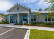 Thumbnail 3 of 25 - Macie Creek Apartments Clubhouse Exterior