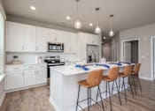Thumbnail 3 of 47 - Kitchen with Island at The Residences at Enso, Florida