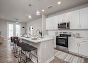 Thumbnail 4 of 47 - Kitchen with Long Island at The Residences at Enso, Jacksonville, FL, 32224