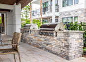 Thumbnail 36 of 47 - Summer Kitchen with seating at The Residences at Enso, Florida