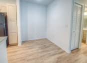 Thumbnail 35 of 40 - an empty room with blue walls and closet doors