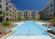 Thumbnail 10 of 31 - Pool with Sundeck and Lounge Seating