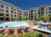 Thumbnail 8 of 31 - Pool with Sundeck and Lounge Seating