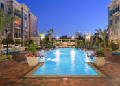Thumbnail 11 of 31 - Pool with Sundeck and Lounge Seating