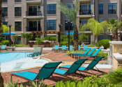 Thumbnail 7 of 31 - Pool with Sundeck and Lounge Seating