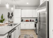 Thumbnail 6 of 60 - Longleaf at St. Johns Apartments | St. Johns, FL | Kitchen