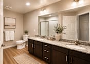 Thumbnail 13 of 44 - Coralina Apartments | Cape Coral, FL | Large Bathroom with dual sinks