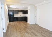 Thumbnail 4 of 18 - Quarry Key West Kitchen & Living Area