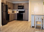 Thumbnail 18 of 25 - Macie Creek Apartments Open Concept Kitchen, Dining and Living Space