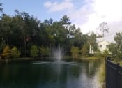 Thumbnail 8 of 10 - Olive Grove Apartments Pond with Fountain