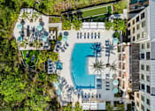 Thumbnail 56 of 60 - Scenic swimming pool at Longboat Key Club Resort, Longboat Key, FL, overlooking tranquil waters