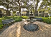 Thumbnail 18 of 39 - The Palms of Clearwater Apartments Courtyard with Fountain