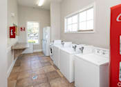 Thumbnail 12 of 12 - Laundry Facilities | Pines at Warrington | Pensacola, FL