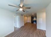 Thumbnail 3 of 16 - Molly Crossing| Middleburg, FL | Living Room with Wood Style Flooring