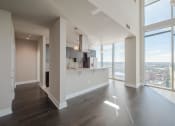 Thumbnail 99 of 114 - Allure Hermann Park | Penthouse Apartment Kitchen & Living Room