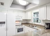 Thumbnail 7 of 20 - Townsgate Apartments | Plant City, FL | Clubhouse Kitchen