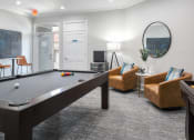 Thumbnail 34 of 42 - The Landings at Boot Ranch | Palm Harbor FL | Billiards Room with Shuffleboard