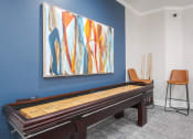 Thumbnail 35 of 42 - The Landings at Boot Ranch | Palm Harbor FL | Billiards Room with Shuffleboard