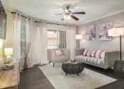 Thumbnail 1 of 42 - The Landings at Boot Ranch | Palm Harbor FL  | Model Living Room