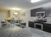 Thumbnail 2 of 42 - The Landings at Boot Ranch | Palm Harbor FL  | Model Kitchen