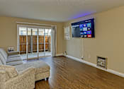 Thumbnail 6 of 16 - Image of living room with balcony located at Ramona Oaks in Riverside, CA
