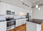 Thumbnail 17 of 22 - kitchen at Spinning Mill Lofts, Clayton, NC 27520
