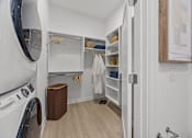 Thumbnail 11 of 63 - A small laundry room with a washer and dryer.at Adler Montford Park + Drexel Townes, Charlotte, NC, 28209