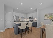 Thumbnail 3 of 30 - Kitchen with Island at Regency Townes, Winterville, NC 28590  