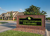 Thumbnail 13 of 14 - the greens apartments sign in front of the club house