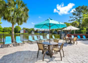 Thumbnail 11 of 17 - Pool deck overlooking the lake