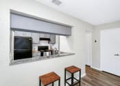 Thumbnail 3 of 17 - Kitchen with Breakfast Bar