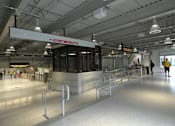 Thumbnail 28 of 36 - Red line station interior with accessibility ramp at 68 Beale Apartments, Massachusetts