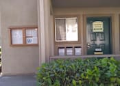 Thumbnail 4 of 19 - Leasing Office Door and Notification Board