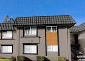 Thumbnail 3 of 6 - Exterior view of building at Vacaville Park Apartments, Vacaville, CA
