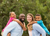 Thumbnail 2 of 19 - Stock photo of multiracial family