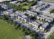 Thumbnail 6 of 6 - A bird's eye view of a residential area with multiple houses.