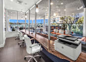 Thumbnail 23 of 34 - A modern office with a large printer on the desk at Esprit Marina del Rey, 90292