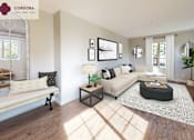 Thumbnail 19 of 39 - A living room with a white couch, a coffee table, and a rug at Mission Hills, Camarillo, 93012