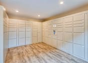 Thumbnail 4 of 13 - a large walk in closet with white cabinets and a wood floor at Villa Vicente, Los Angeles, CA