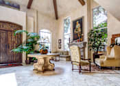 Thumbnail 3 of 17 - a living room filled with furniture and a table