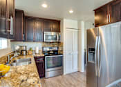 Thumbnail 8 of 17 - Fully Equipped Kitchen at L'Estancia, Studio City, CA