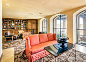 Thumbnail 33 of 36 - a living room with large windows and a orange couch  at Marina Harbor, Marina del Rey, 90292