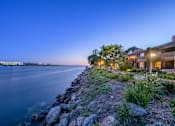Thumbnail 5 of 16 - a home on the water overlooking the water at night at Mariners Village, Marina del Rey, California