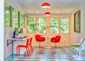 Thumbnail 3 of 13 - an office with red chairs and a table with a computer  at Rancho Los Feliz, Los Angeles, CA, 90039