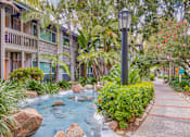 Thumbnail 6 of 13 - a sidewalk with a water feature in front of a building  at Rancho Los Feliz, California