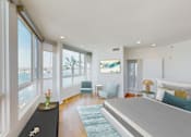 Thumbnail 4 of 34 - A bedroom with a large bed and a view of the ocean at Esprit Marina del Rey, 90292