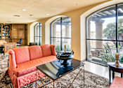 Thumbnail 23 of 24 - A living room with a red sofa and a glass coffee table at Marina Harbor, California, 90292